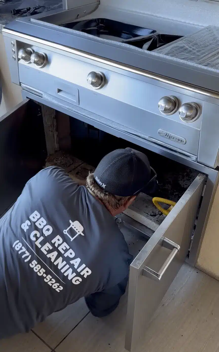 Pro Grill technician servicing a built-in BBQ grill