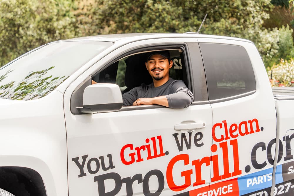 About Progrill Cleaning Pro Grill employee with a Pro Grill service truck